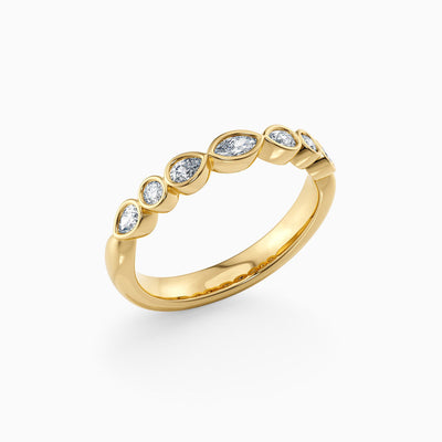 The Rhoda bezel set lab grown diamond wedding band with marquise, pear and round diamonds