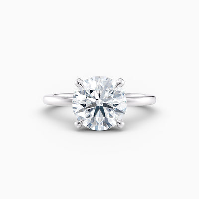 The Alicia round brilliant lab grown diamond solitaire engagement ring with hidden halo