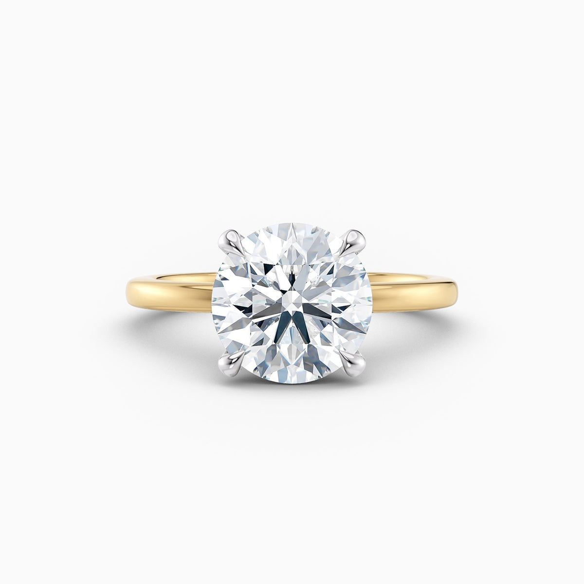 The Alicia round brilliant lab grown diamond solitaire engagement ring with hidden halo