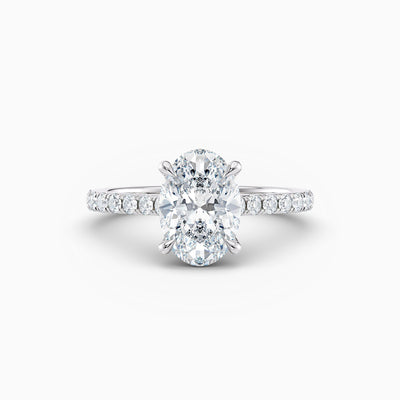 The Sophia oval lab grown diamond engagement ring with hidden halo and upswept diamond band