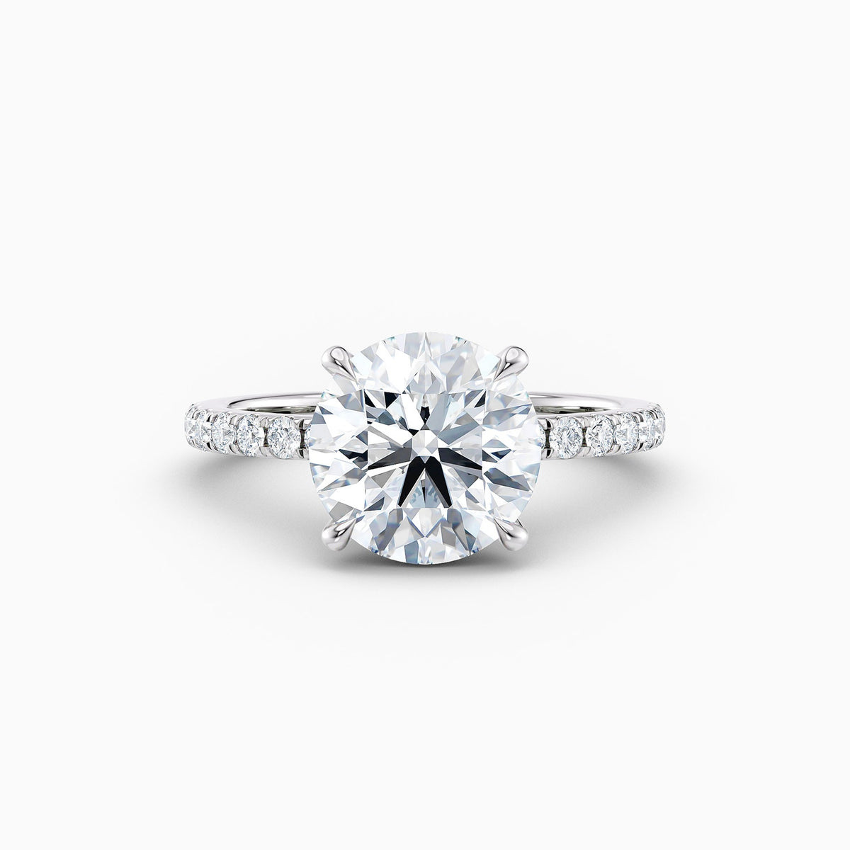 The Cora round brilliant lab grown diamond engagement ring with hidden halo and diamond band