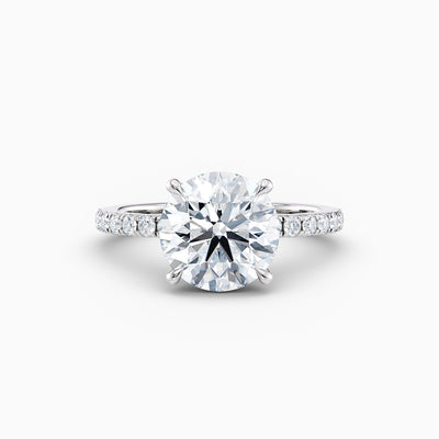 The Cora round brilliant lab grown diamond engagement ring with hidden halo and diamond band