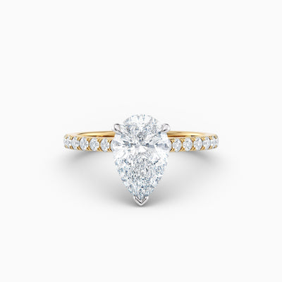 The Sophia pear shaped lab grown diamond engagement ring with hidden halo and upswept diamond band
