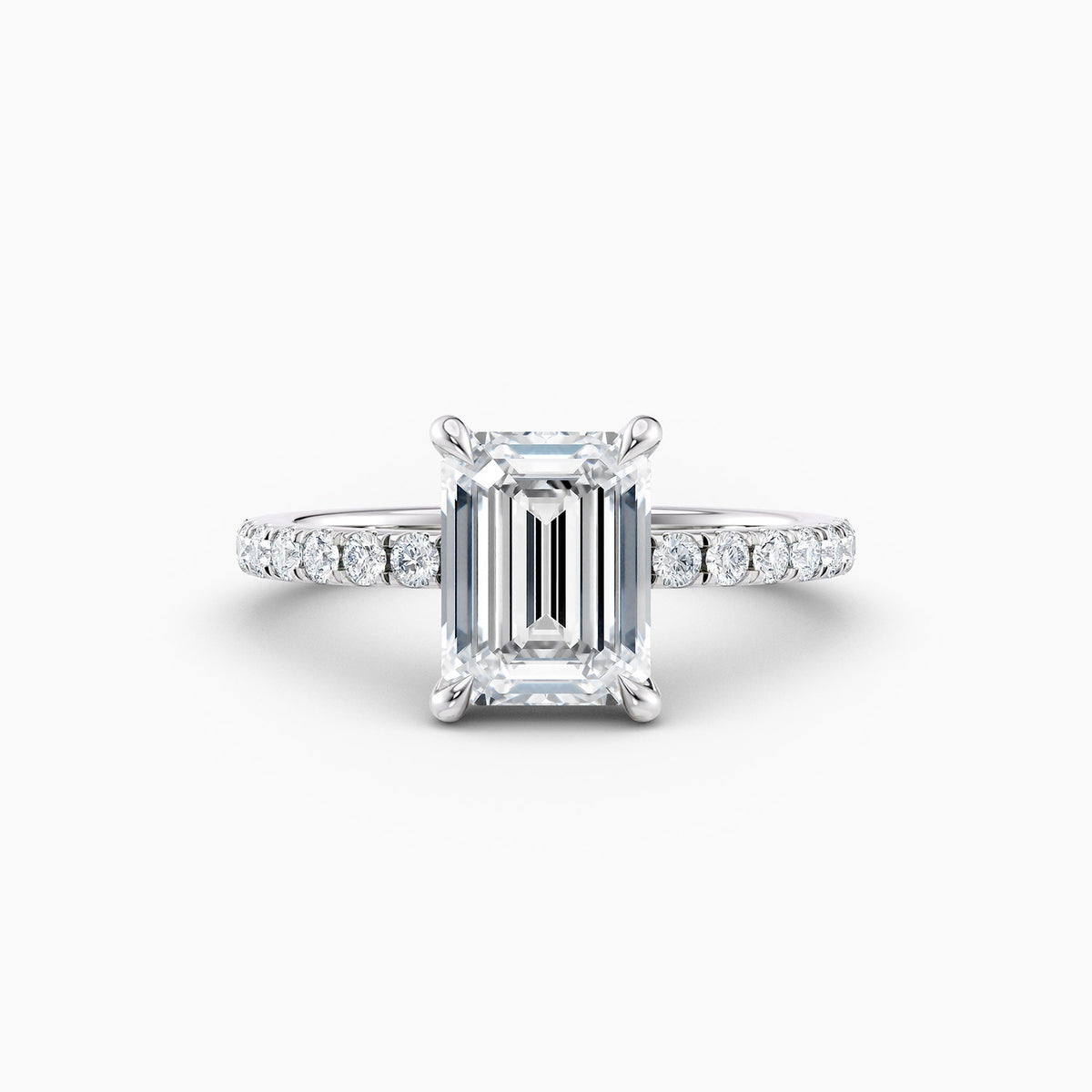The Cora emerald cut lab grown diamond engagement ring with hidden halo and diamond band