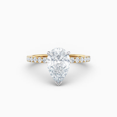 The Charlotte pear shaped lab grown diamond engagement ring with hidden halo and diamond band