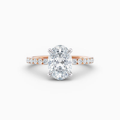 The Cora oval lab grown diamond engagement ring with hidden halo and diamond band