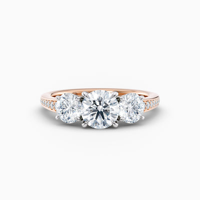 The Adelle round brilliant lab grown diamond three stone engagement ring with pavé band