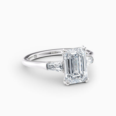 Emerald cut lab grown diamond three stone engagement ring with tapered baguette side stones, hand-crafted in Brisbane