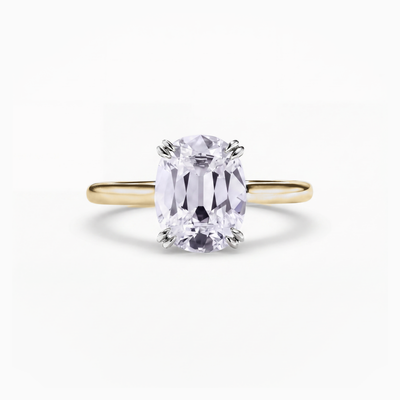The Alicia Cushion solitaire engagement ring in 18ct yellow gold and platinum, a 2.00 carat cushion cut lab-grown diamond held in double claws