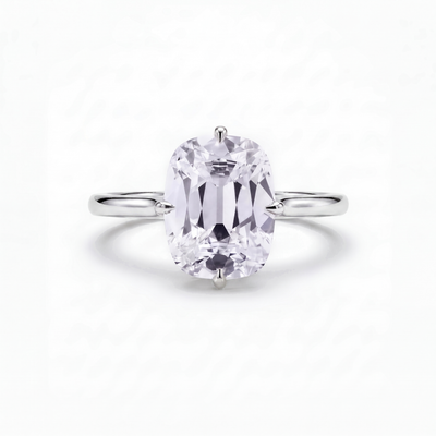 The Eve engagement ring in platinum, a 2.00 carat old mine cushion cut lab-grown diamond solitaire held in compass claws