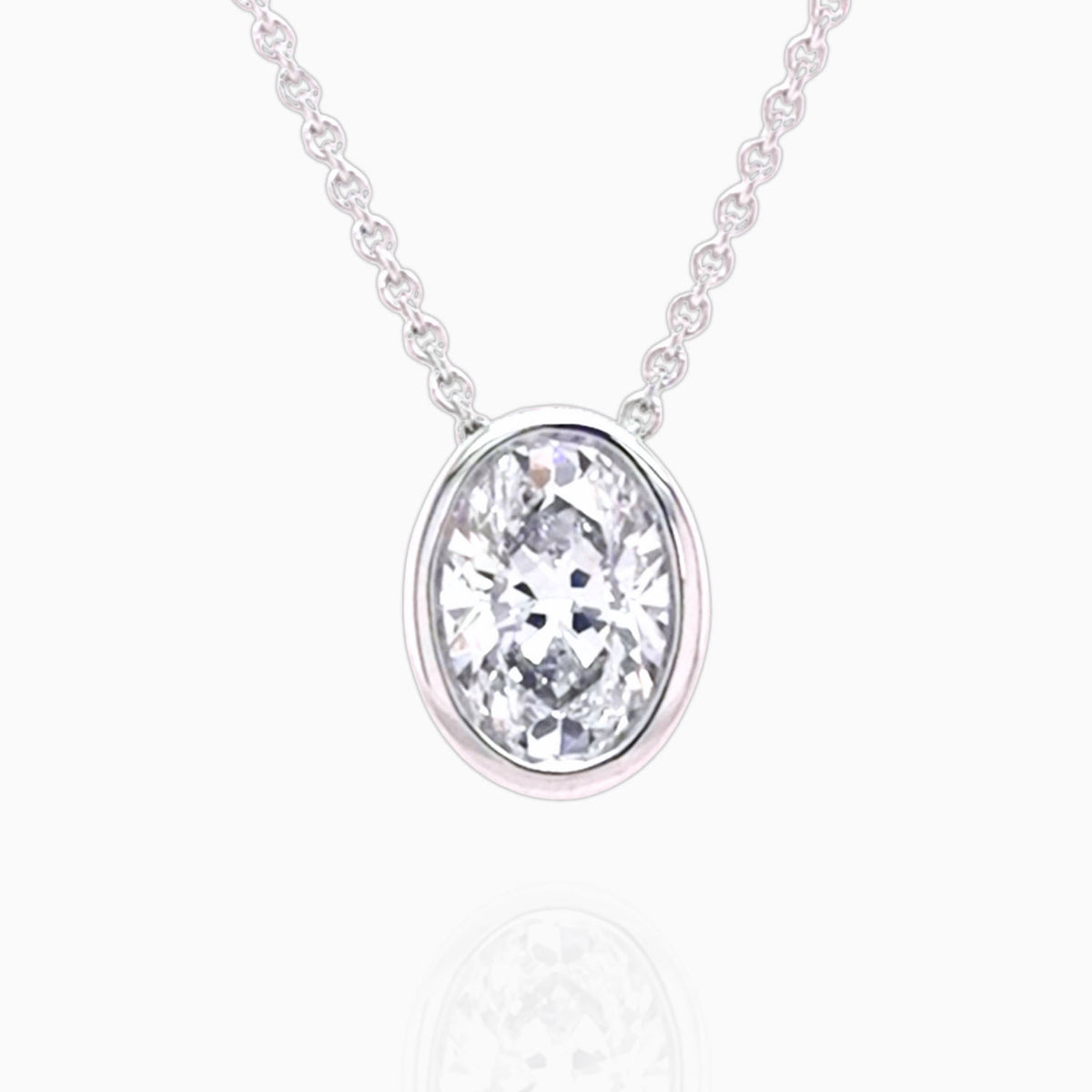 The Aurie oval lab grown diamond bezel slider necklace in 18ct white gold