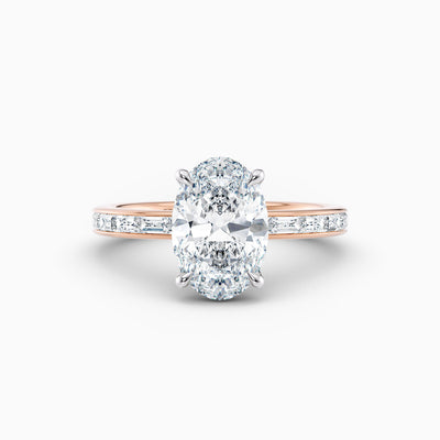 The Eleanor oval lab grown diamond engagement ring with channel set baguette diamond band