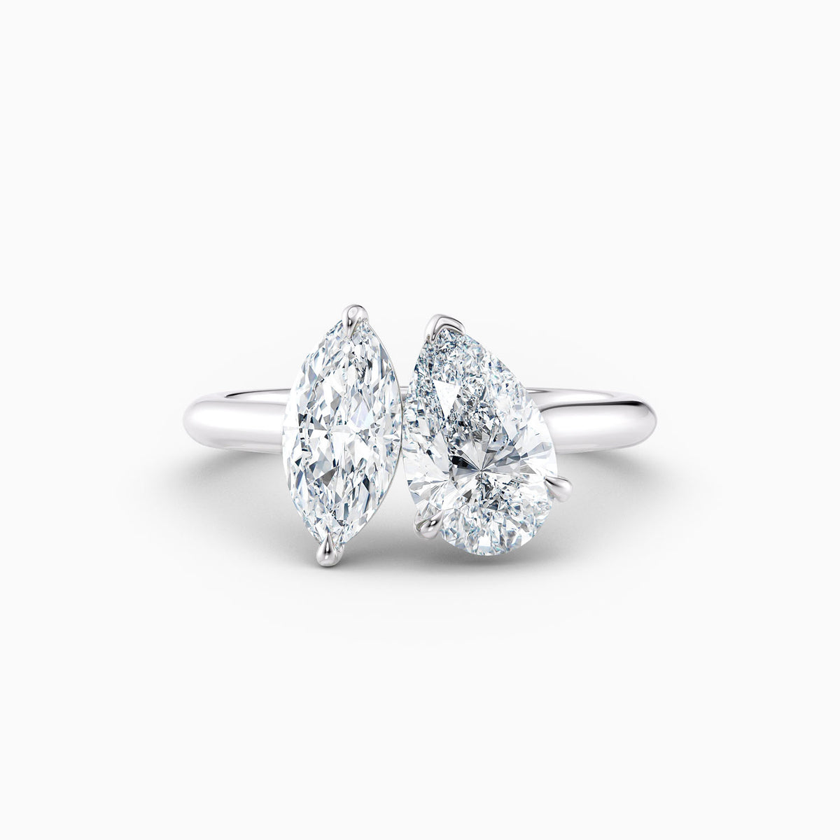 The Alexa toi et moi engagement ring with pear and marquise lab grown diamonds in a twisted claw setting