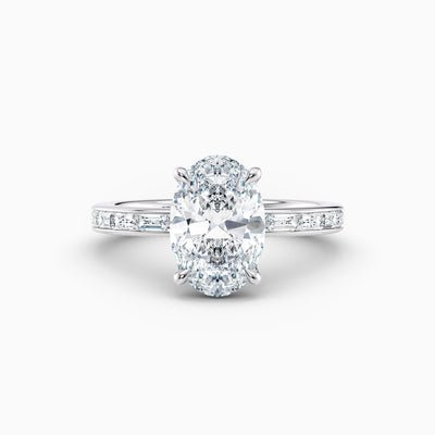 The Eleanor oval lab grown diamond engagement ring with channel set baguette diamond band