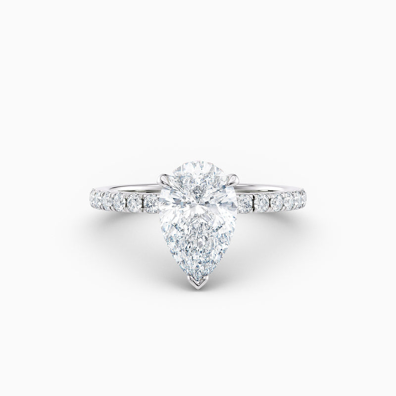 The Charlotte pear shaped lab grown diamond engagement ring with hidden halo and diamond band
