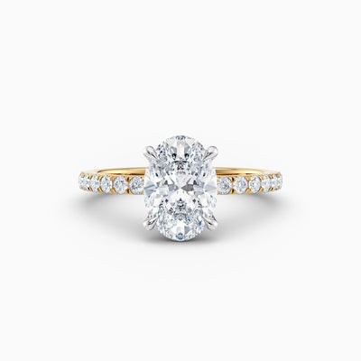 The Cora oval lab grown diamond engagement ring with hidden halo and diamond band
