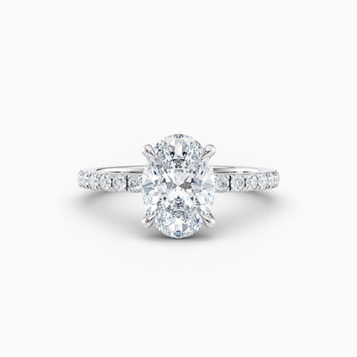 The Cora oval lab grown diamond engagement ring with hidden halo and diamond band