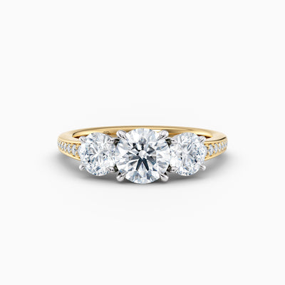 The Adelle round brilliant lab grown diamond three stone engagement ring with pavé band