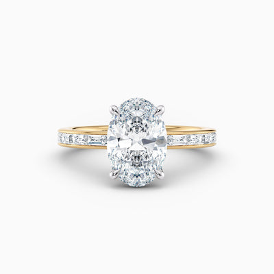 The Eleanor oval lab grown diamond engagement ring with channel set baguette diamond band