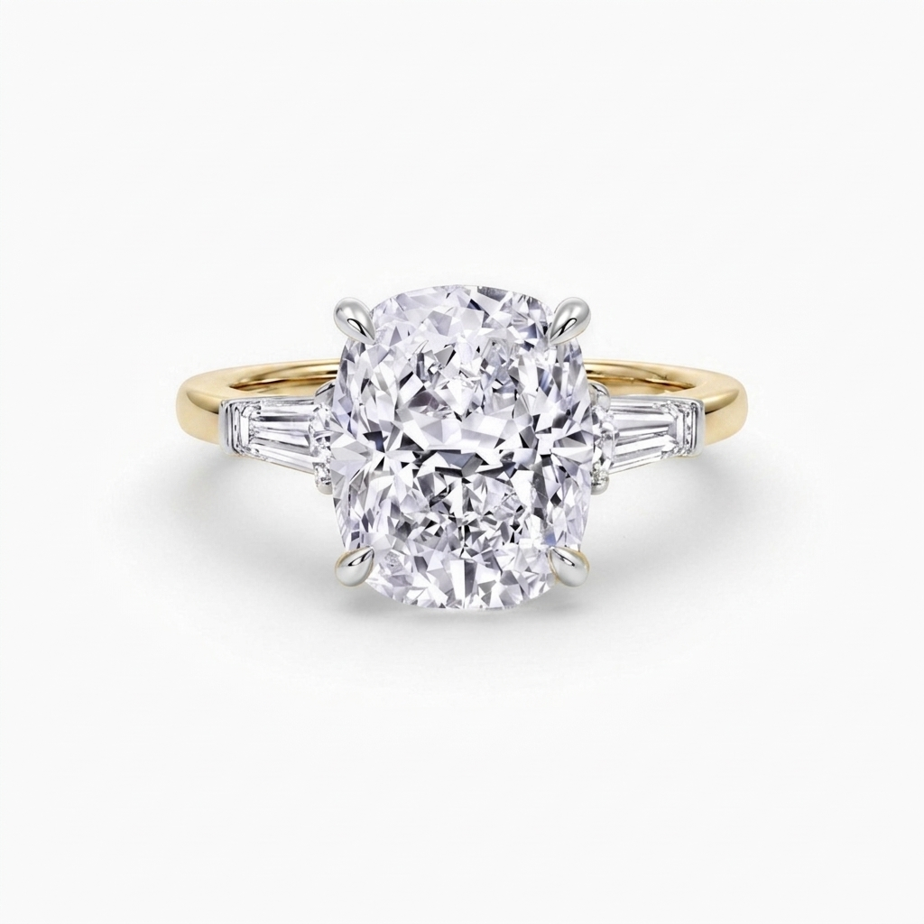 The Francis cushion cut lab grown diamond three stone engagement ring with tapered baguette side stones