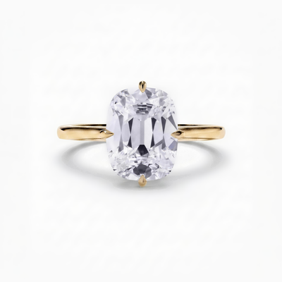 The Eve engagement ring in 18ct yellow gold, a 2.00 carat old mine cushion cut lab-grown diamond solitaire held in compass claws