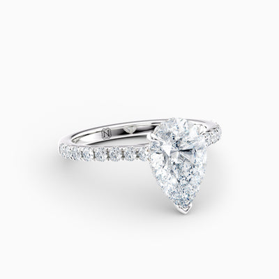 The Sophia pear shaped lab grown diamond engagement ring with hidden halo and upswept diamond band